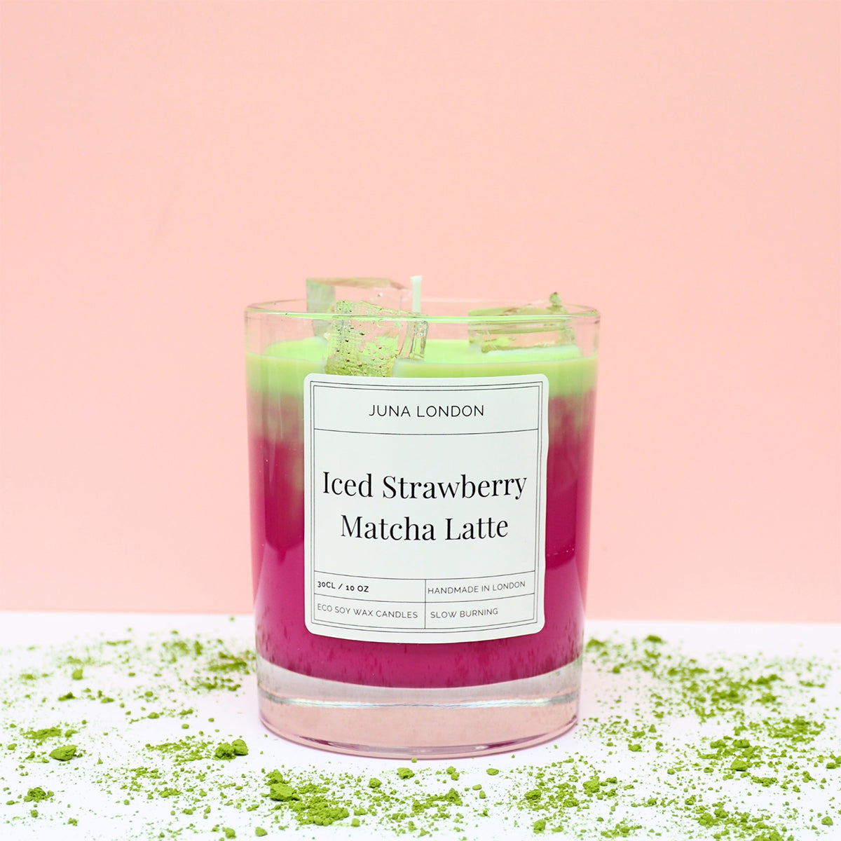 A decorative, vibrant candle to adorn any shelf, dresser or bedside table. Handcrafted from a combination of gel and soy wax, known for their clean and long-lasting burn time. Jelly-like ice cubes are a tactile, hyper-realistic touch making our Iced Strawberry Matcha Latte Candle one of a kind - the perfect gift idea for the matcha-obsessed. 