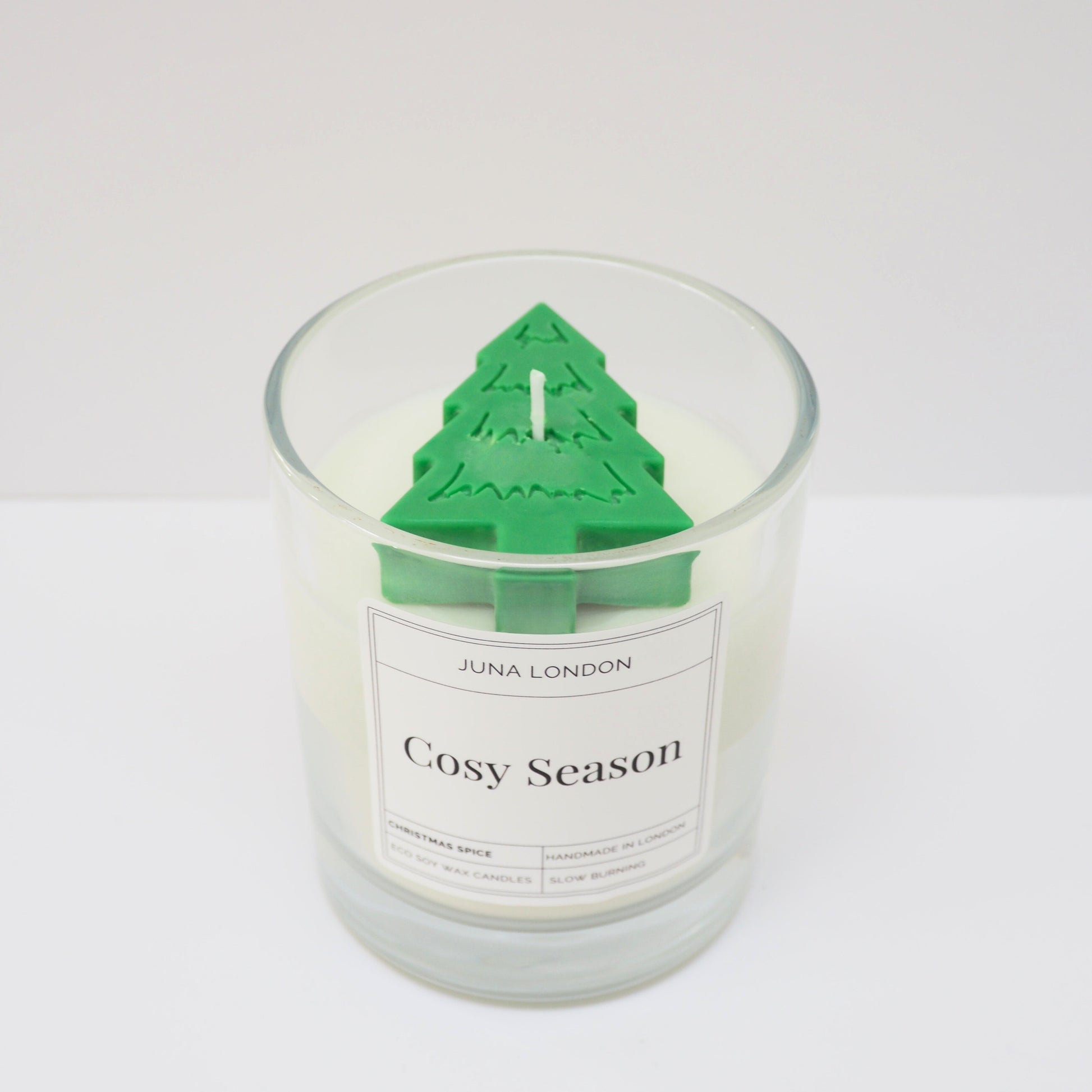 Nothing says Christmas like candlelight paired with twinkling lights on the tree! Meet our NEW limited-edition Christmas Tree Candle with 3D tree topper. Make it your own or grant a friend or family member's Christmas wish by personalising the text with your own unique message. With a choice of our bespoke scents, infused with premium fragrance and essential oils -  opt for Christmas Spice or our Freshly Baked scents for an cosy, nostalgic atmosphere.
