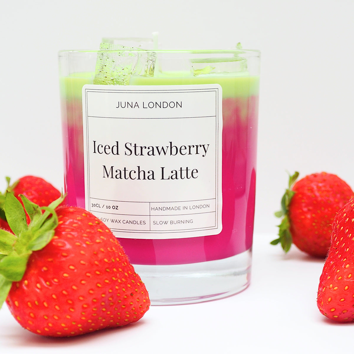 A decorative, vibrant candle to adorn any shelf, dresser or bedside table. Handcrafted from a combination of gel and soy wax, known for their clean and long-lasting burn time. Jelly-like ice cubes are a tactile, hyper-realistic touch making our Iced Strawberry Matcha Latte Candle one of a kind - the perfect gift idea for the matcha-obsessed. 