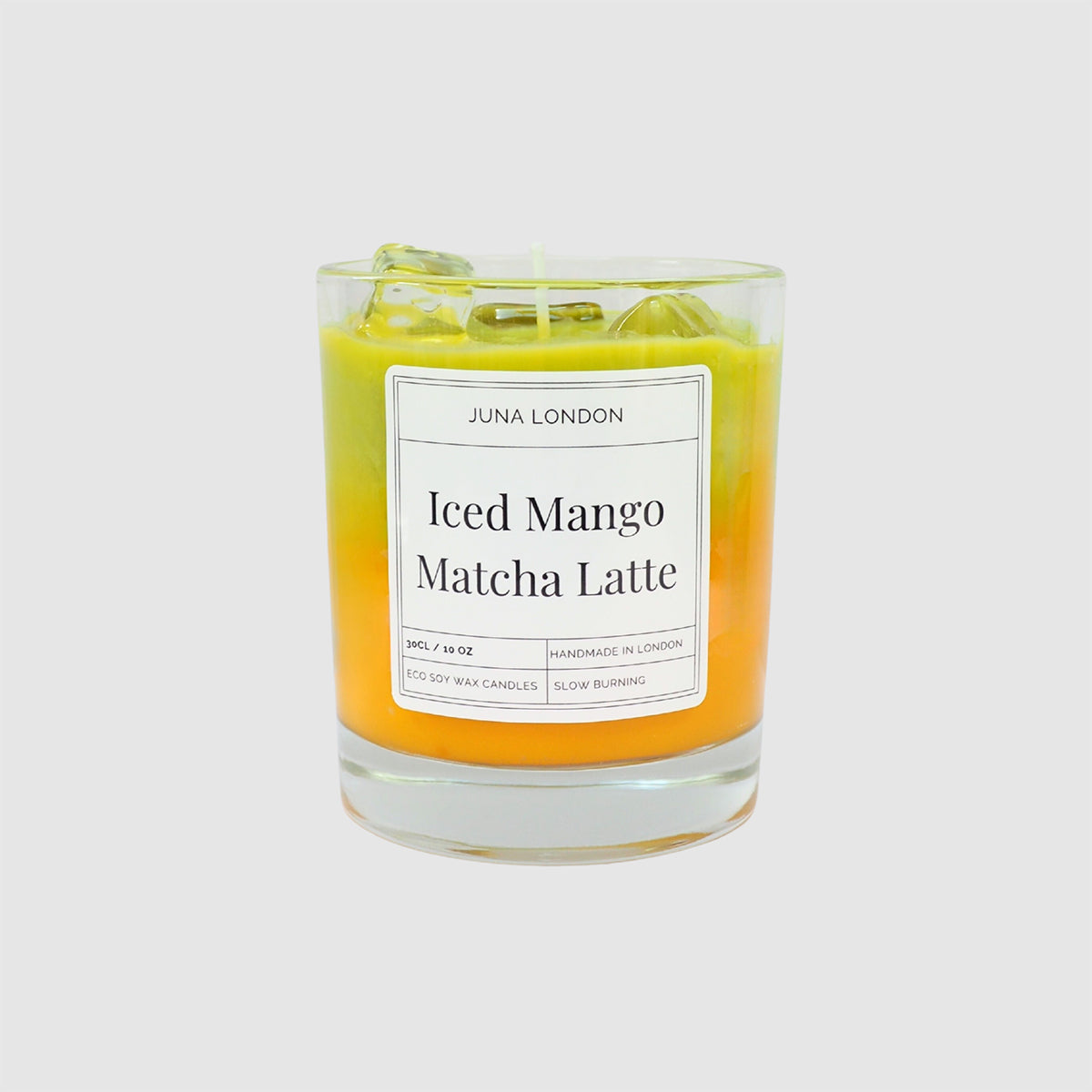 JUNA London The Iced Mango Matcha Latte Candle. Handmade with soy wax and  gel wax, scented with matcha and mango fragrance and essential oils. Ideal for gifting to matcha lovers.