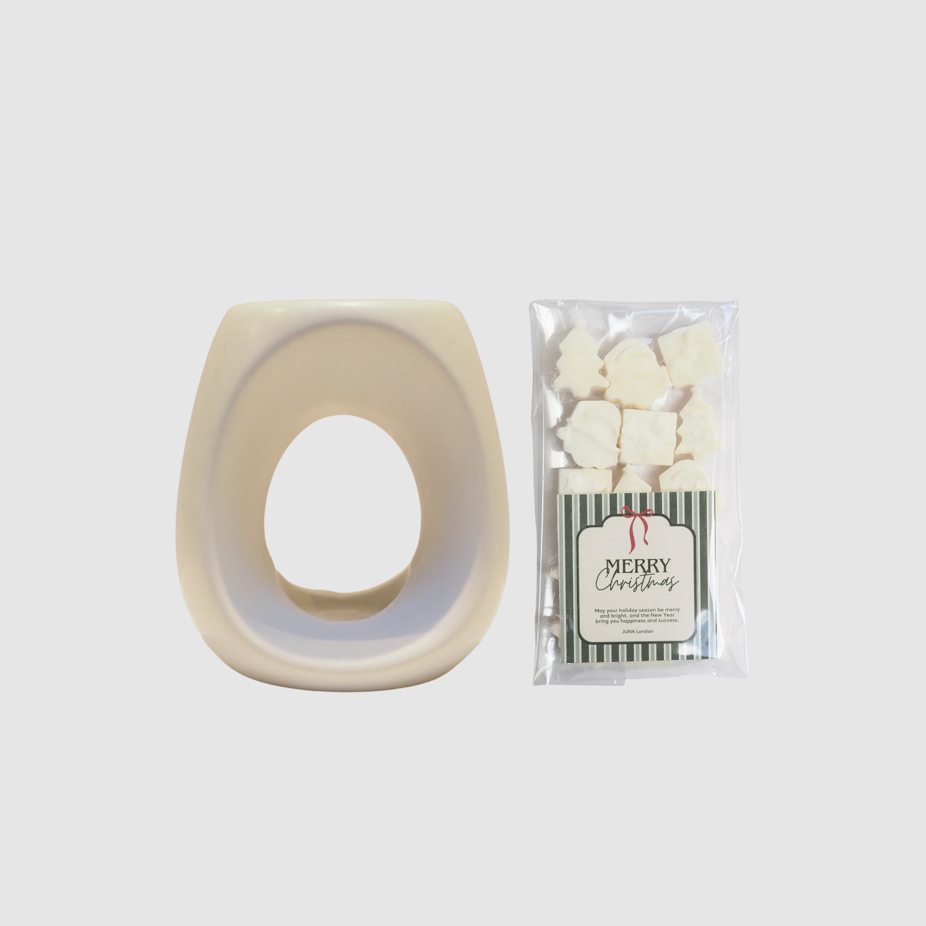 Discover our limited-edition Wax Melt Burner Gift Set including ceramic Wax Melt Burner and our much-loved Christmas Wax Melts - featuring Christmas Tree, present and Father Christmas designs. Scented with our much-loved Christmas Spice bespoke fragrance, bringing a comforting and nostalgic atmosphere to your home this festive season.