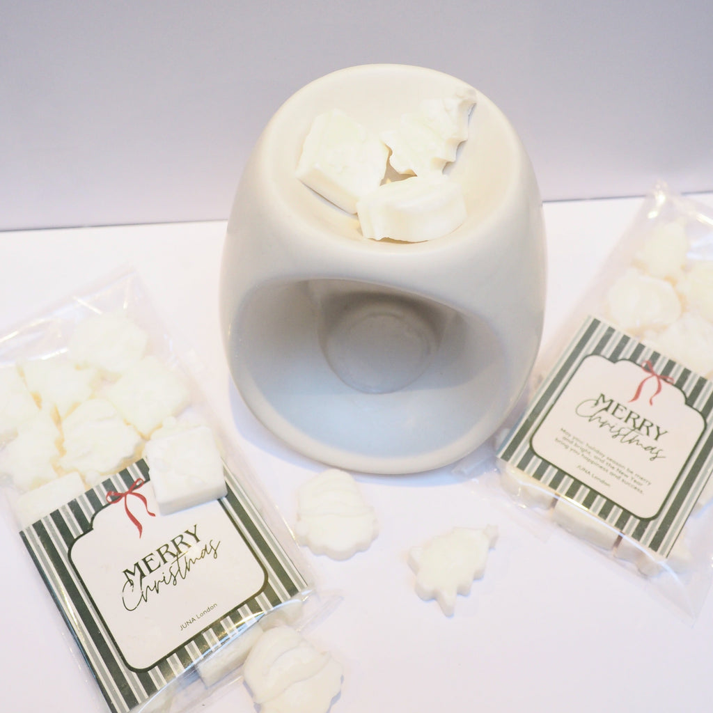 Discover our limited-edition Wax Melt Burner Gift Set including ceramic Wax Melt Burner and our much-loved Christmas Wax Melts - featuring Christmas Tree, present and Father Christmas designs. Scented with our much-loved Christmas Spice bespoke fragrance, bringing a comforting and nostalgic atmosphere to your home this festive season.